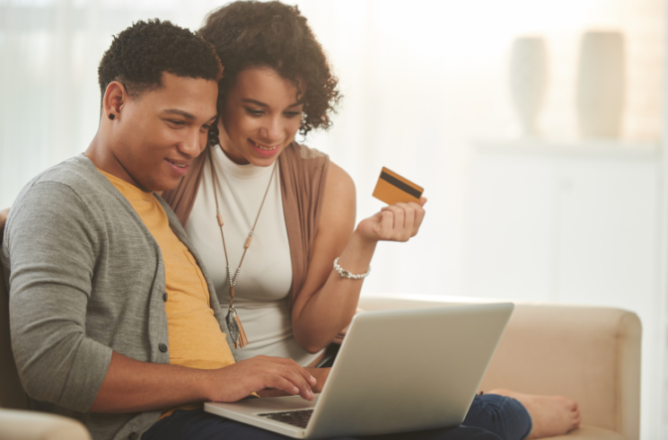 Couple looking at laptop